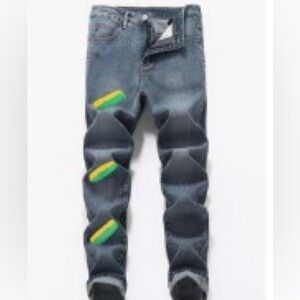 Men’s straight blue jeans with yellow and green paint